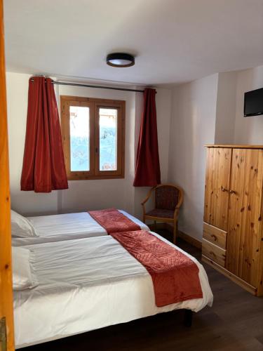 Ένα ή περισσότερα κρεβάτια σε δωμάτιο στο Montana 1