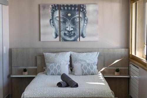 Ένα ή περισσότερα κρεβάτια σε δωμάτιο στο Appartement vue mer