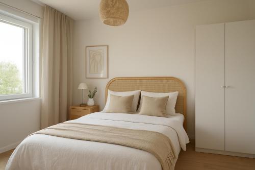 Postel nebo postele na pokoji v ubytování Lahti Vesijärvi Lake Side Life 2-room Apartment