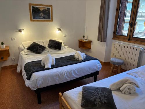 Кровать или кровати в номере Montana 3