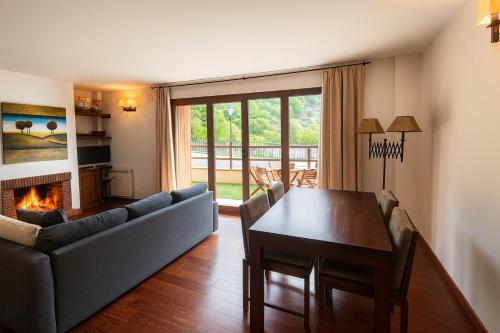 Et opholdsområde på Vall Fosca - Apartamento con espectaculares vistas y jardín privado