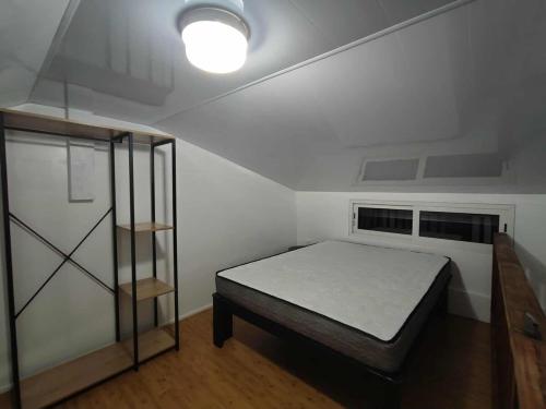 Ένα ή περισσότερα κρεβάτια σε δωμάτιο στο Mape Faaroa Bay Villa