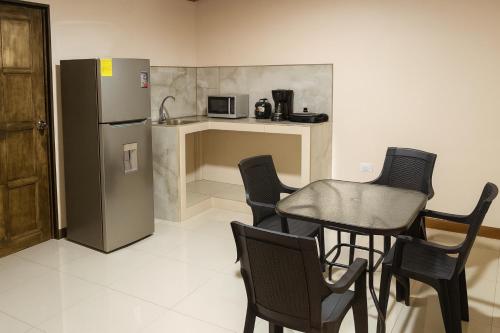 Kuchyň nebo kuchyňský kout v ubytování KEYTRI Rooms