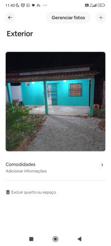 een webpagina met een blauw gebouw bij Espaço doce aconchego 2 in Morros