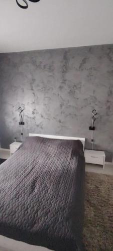 Ένα ή περισσότερα κρεβάτια σε δωμάτιο στο LCB Apartments P Victoriei Ploieşti