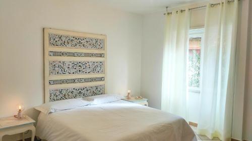 Ένα ή περισσότερα κρεβάτια σε δωμάτιο στο Kenza Rooms