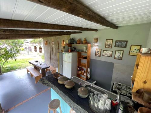 Kuchyň nebo kuchyňský kout v ubytování Dona Canoa Hospedaria