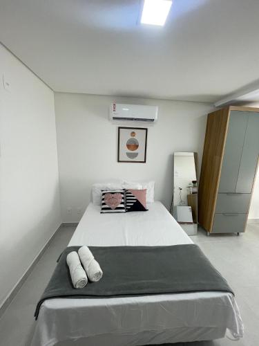 Ένα ή περισσότερα κρεβάτια σε δωμάτιο στο Melhores Flats - Relaxante, à beira-mar