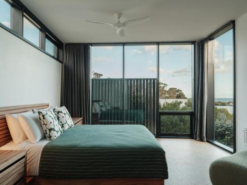 Ένα ή περισσότερα κρεβάτια σε δωμάτιο στο Obliqua