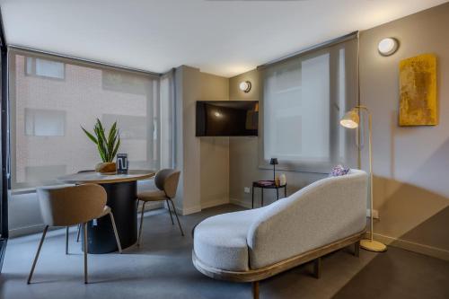 a living room with a couch and a table at NOK Luxury 3BR in Bogota with Terrace in street 84 in Bogotá