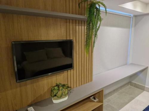 TV/trung tâm giải trí tại Melhores Flats - Privilégio, pertinho do mar