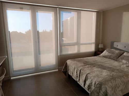 Postel nebo postele na pokoji v ubytování Icono studio