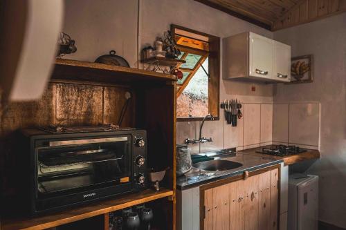 Ảnh trong thư viện ảnh của Vale das Araucárias - Tijolinho Chalet - with Ofurô ở Itamonte