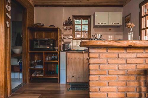 Ảnh trong thư viện ảnh của Vale das Araucárias - Tijolinho Chalet - with Ofurô ở Itamonte