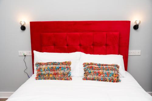 Ένα ή περισσότερα κρεβάτια σε δωμάτιο στο Parador Villa