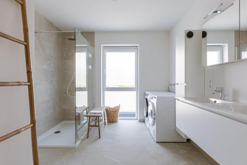 Phòng tắm tại Vakantiewoning Sable Dor