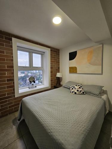 Llit o llits en una habitació de Modra 902