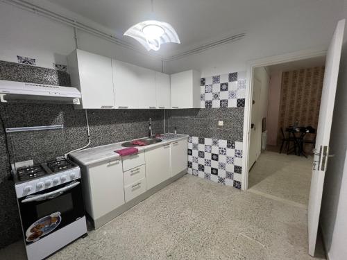 Η κουζίνα ή μικρή κουζίνα στο Coquette-Appart