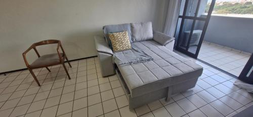 Ein Sitzbereich in der Unterkunft Flat Moderno no Jardim Renascença a 6min da Praia, Shoppings e Centro
