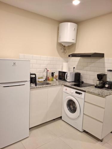 Η κουζίνα ή μικρή κουζίνα στο Dpto Resort zona aeropuerto