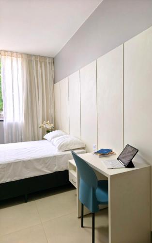 Ένα ή περισσότερα κρεβάτια σε δωμάτιο στο Hote AeroBand