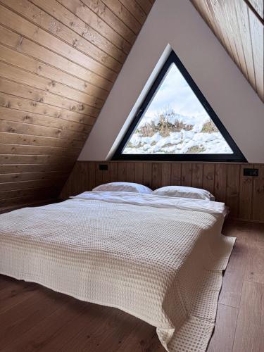 Ένα ή περισσότερα κρεβάτια σε δωμάτιο στο Lofty House Mountain