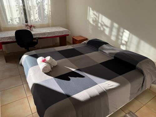 Giường trong phòng chung tại Cabañas Refugio Arqueologico