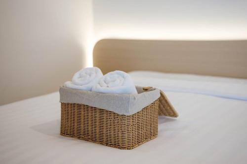 Voodi või voodid majutusasutuse Minimalistic Pool Villa toas