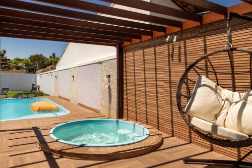 Πισίνα στο ή κοντά στο Mansão em Itauna - Saquarema - Com piscina para ate 16 pessoas
