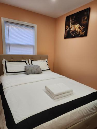 Ένα ή περισσότερα κρεβάτια σε δωμάτιο στο Unique Monthly Rentals For Professionals