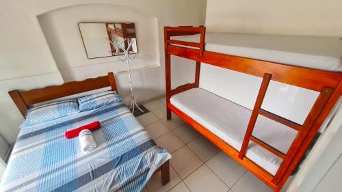 Postel nebo postele na pokoji v ubytování Pousada Vitória