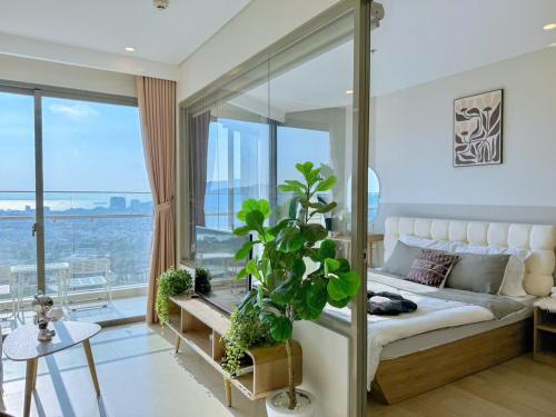 Ένα ή περισσότερα κρεβάτια σε δωμάτιο στο THE SÓNG SEA APARTMENT VUNG TAU - CĂN HỘ VEN BIỂN VŨNG TÀU - Sam House