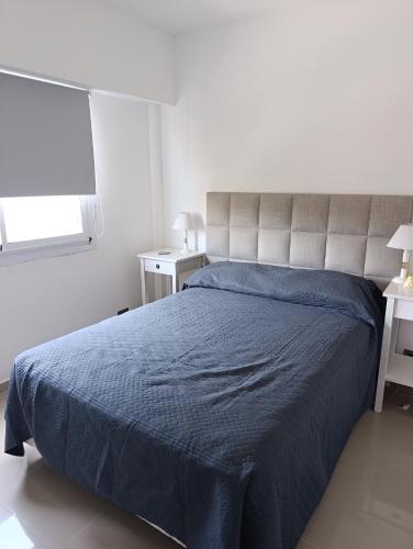 Giường trong phòng chung tại Departamento Polaris