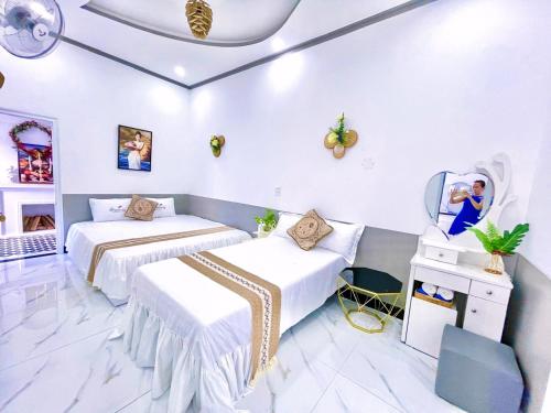 Ένα ή περισσότερα κρεβάτια σε δωμάτιο στο Hoàng Nga 1 Apartment