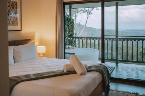 Ένα ή περισσότερα κρεβάτια σε δωμάτιο στο Nebesa