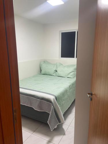 Un pat sau paturi într-o cameră la Avôhai