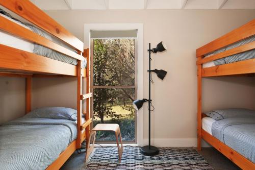 Ένα ή περισσότερα κρεβάτια σε δωμάτιο στο The Paddock in Berry