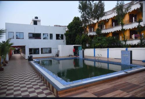 Hồ bơi trong/gần Meghbari Beach Hotel Mandarmani