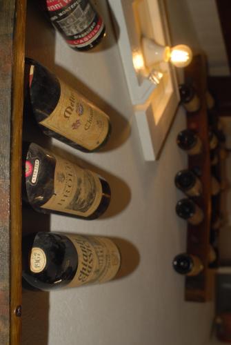 a bunch of bottles of wine in a refrigerator at B&B Eridu in Fiesole