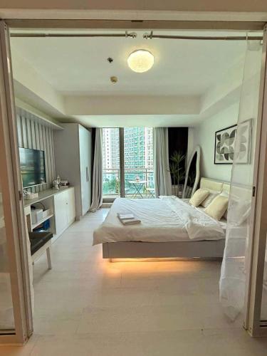 Ένα ή περισσότερα κρεβάτια σε δωμάτιο στο Light residence