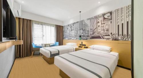 Ένα ή περισσότερα κρεβάτια σε δωμάτιο στο City Comfort Inn Shenzhen Exhibition Center North Huaqiang Metro Station