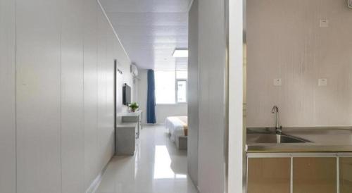 Фотография из галереи GreenTree Apartment Jinan Jiyan Road Shandong Cancer Hospital в Цзинане