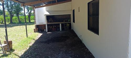 an outside view of a building with a porch at El Paraiso in Navarro