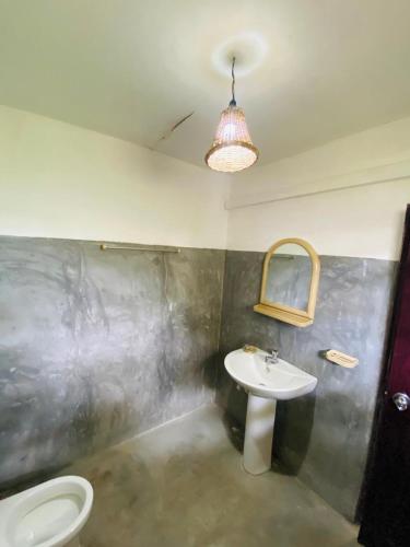 Ένα μπάνιο στο Lagoon Home Stay