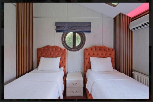 Ένα ή περισσότερα κρεβάτια σε δωμάτιο στο Villa Asel