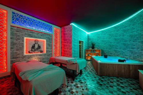 Una cama o camas en una habitación de Alan Xafira Deluxe Resort & Spa-ULTRA ALL INCLUSIVE