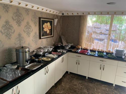 Kuchyň nebo kuchyňský kout v ubytování Send Apart Otel