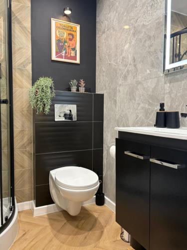 Ένα μπάνιο στο Apartament na Starym Mieście Lisowskiego