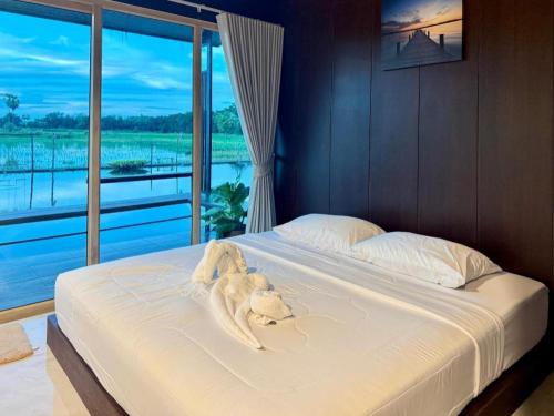 Кровать или кровати в номере Nornnadubua