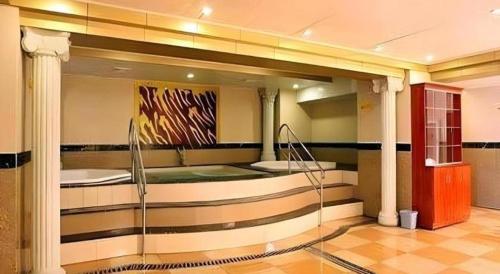 Ένα μπάνιο στο Economic Trade Hotel